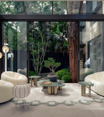 Villa D'Este Glass Enclosed Sunroom Boucle Seating Internal Garden