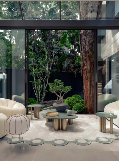 Villa D'Este Glass Enclosed Sunroom Boucle Seating Internal Garden